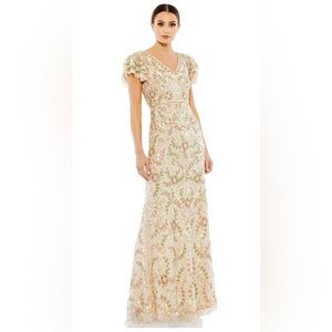 Mac Duggal Embellished Ruffled Cap Sleeve V-Neck Gown Nude has some missing gems